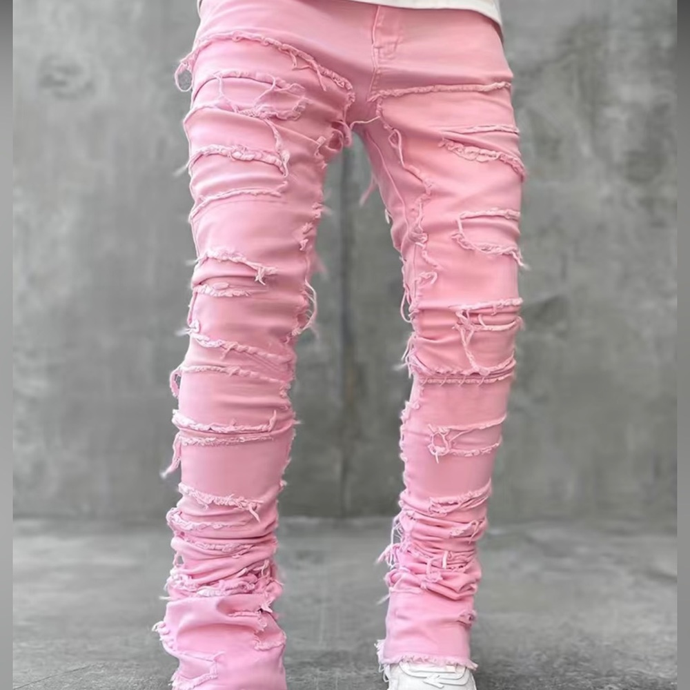 Pink shredded flare jeans
